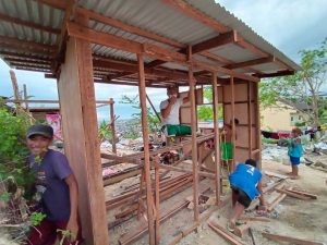 Abounding in Love team rebuilding a house destroyed by Typhoon Odette